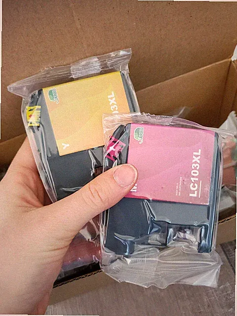 box of new unopened printer inks